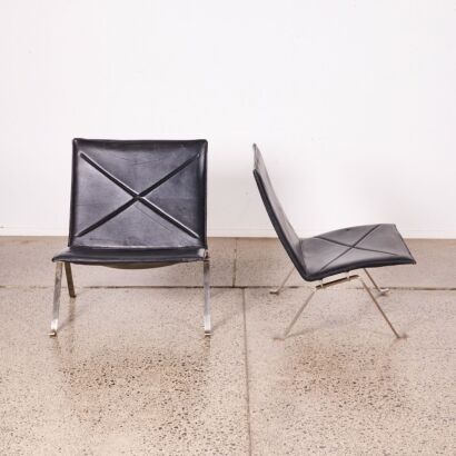 A Pair Of Leather Homage Pk22 Style Chairs