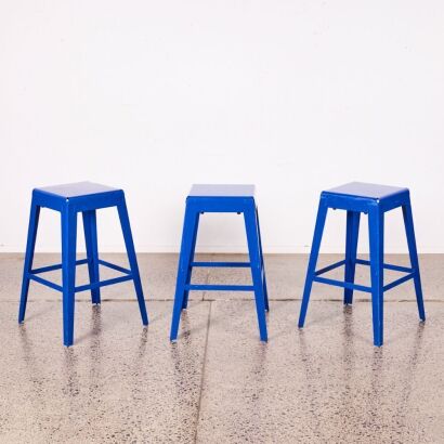 A Trio Of Metal Blue Barstools