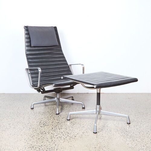 An Aluminium Lounge Chair Ea 124 & Ottoman Ea 125 By Charles & Ray Eames For Vitra