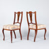 A Pair of Edwardian Carved Side Chairs