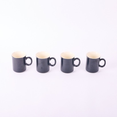 A Set Of Four Rare Crown Lynn Black Glaze Coffee Cups