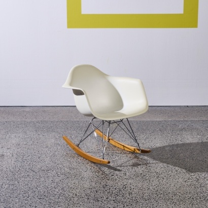 An Eames Plastic Rocking Chair RE RAR by Vitra