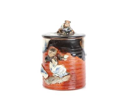 A Sumida Pottery Lidded Cylindrical Tobacco Jar with Relief Boy Figures