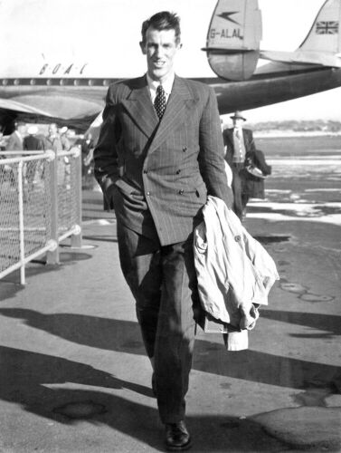 Sir Edmund Hillary as he stepped off a BOAC Constellation at Mascot Today