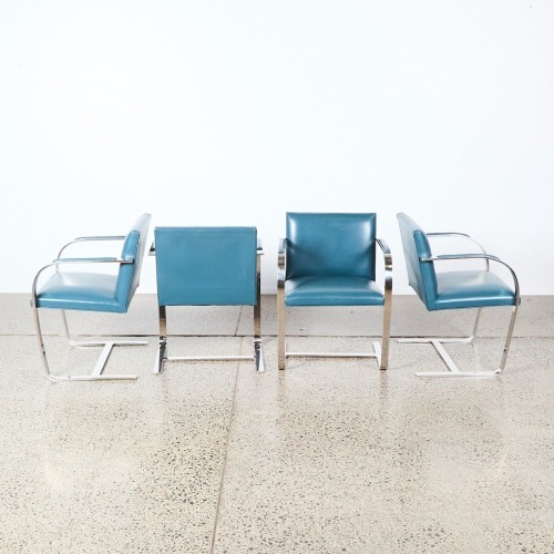 A Set Of Four Post Modern Cantilever Chairs