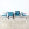 A Set Of Four Post Modern Cantilever Chairs
