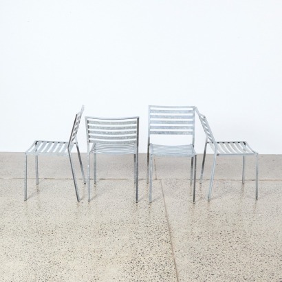 A Set Of Four Andrew Patterson & Michael Draper Galvanised Steel Outdoor Dining Chairs