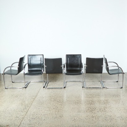 A Set Of Six Post Modern Dinning Chairs