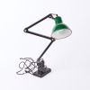 A Vintage Articulated Lamp With Enamel Shade