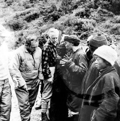 Desmond Doig, Marlin Perkins and Villagers with Bearskin