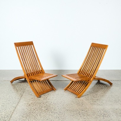 A Pair Of Cumaru Lounge Chairs