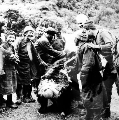 Marlin Perkins with Villagers and Bearskin
