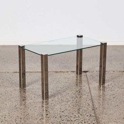A Vintage Compact Stainless Steel and Glass Coffee Table