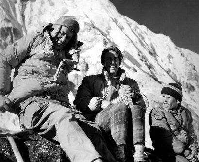 Peter, Lady and Sir Edmund Hillary rest on the Pumari Ridge