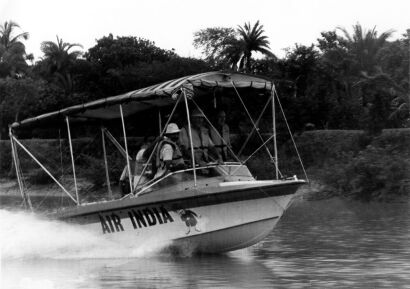 Jon Hamilton Guns One of the Jet Boats along a Channel of the Delta of the Ganges