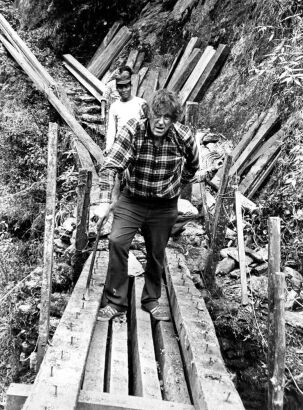 Sir Edmund Hillary Helping to Repair the Inuku Bridge