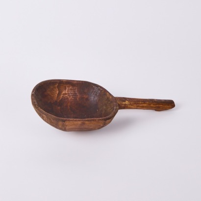 A Primitive Carved Wooden Scoop